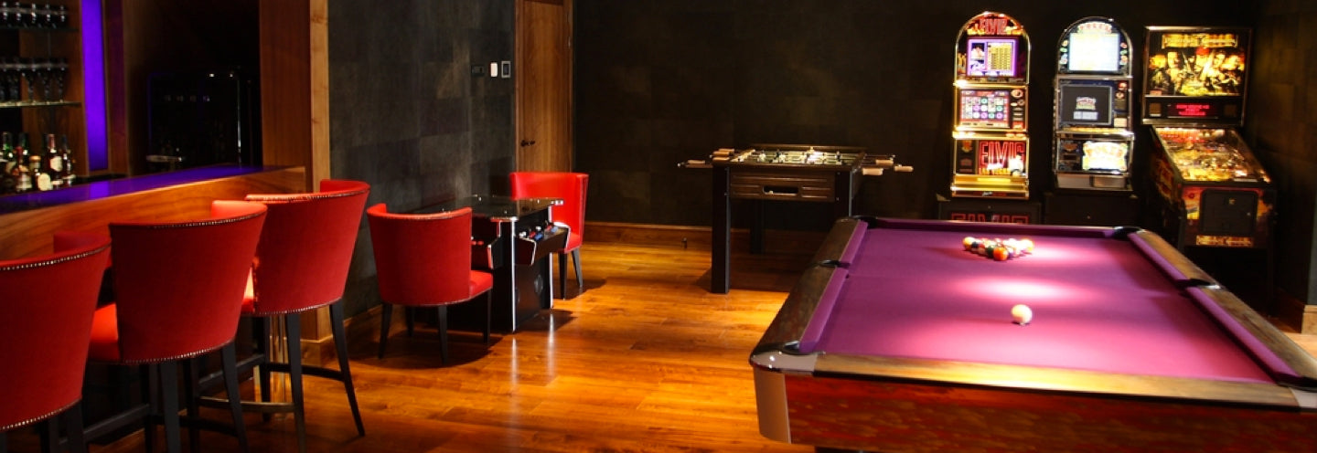 A luxury games room in Hertfordshire showcasing a bespoke copper pool table