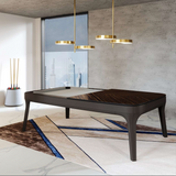Dining table with a unique design in a room with chairs and decor.