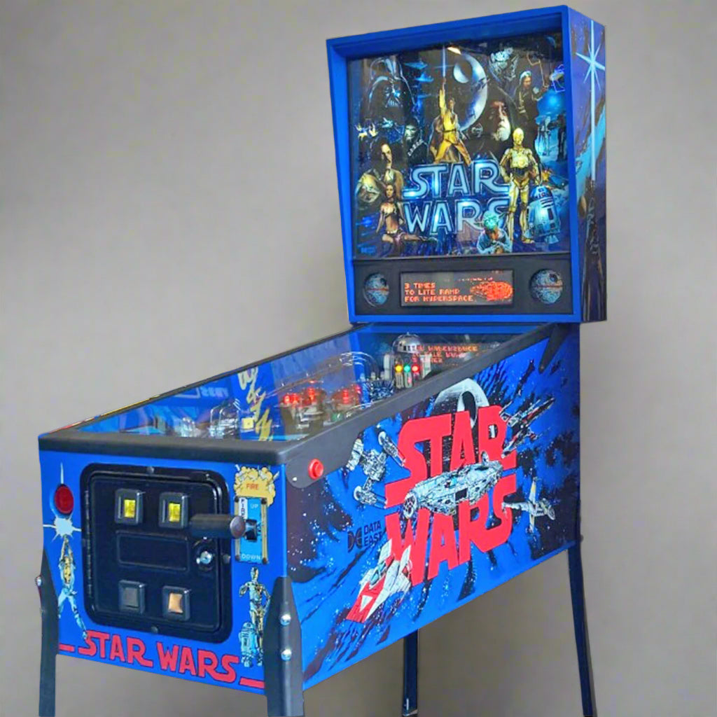 A 1992 Star Wars themed pinball machine featuring iconic characters and imagery from the franchise, set against a cosmic space background.