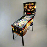 A restored 2006 Pirates of the Caribbean pinball machine by Stern, featuring colorful artwork and a clear playfield.