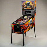 A pinball machine with artwork inspired by the Mandalorian series, featuring characters and a spacecraft from the show.