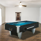 A 7ft Proline II American Pool Table in black with a solid wood frame and metallic accents on the frame and table body, placed in a room with a white wall and a ceiling fan.