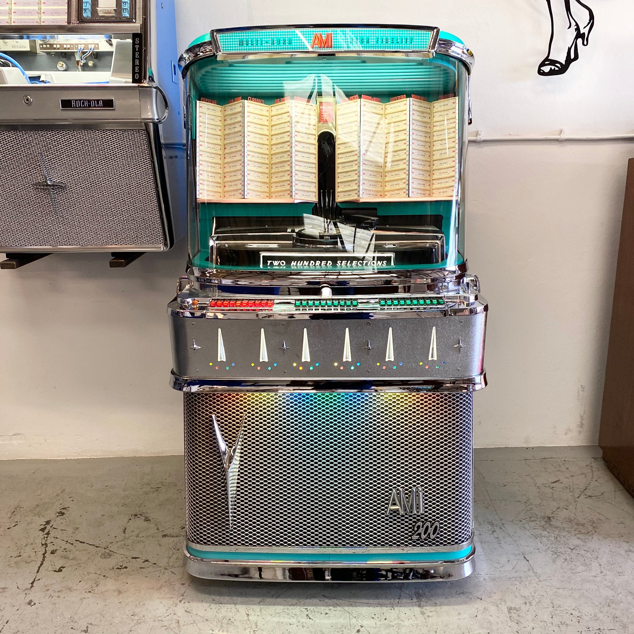 Original 1958 AMI I 200 Vinyl Jukebox with Spearmint Trim